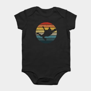 BASE jumping Silhouette On A Distressed Retro Sunset graphic Baby Bodysuit